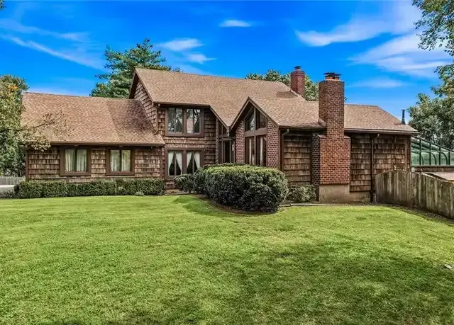 Cedar-sided two-story home in an Overland Park neighborhood