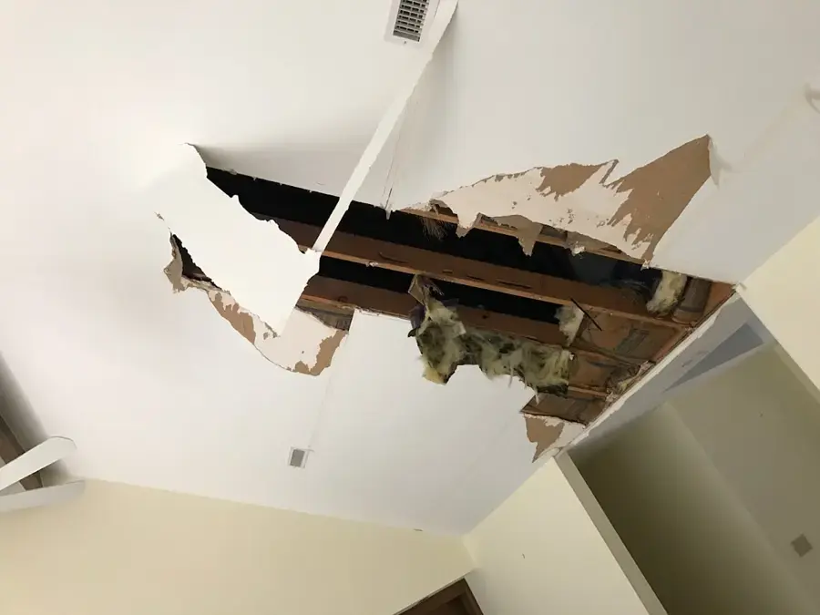 Water-stained ceiling from a leak above in an Overland Park home